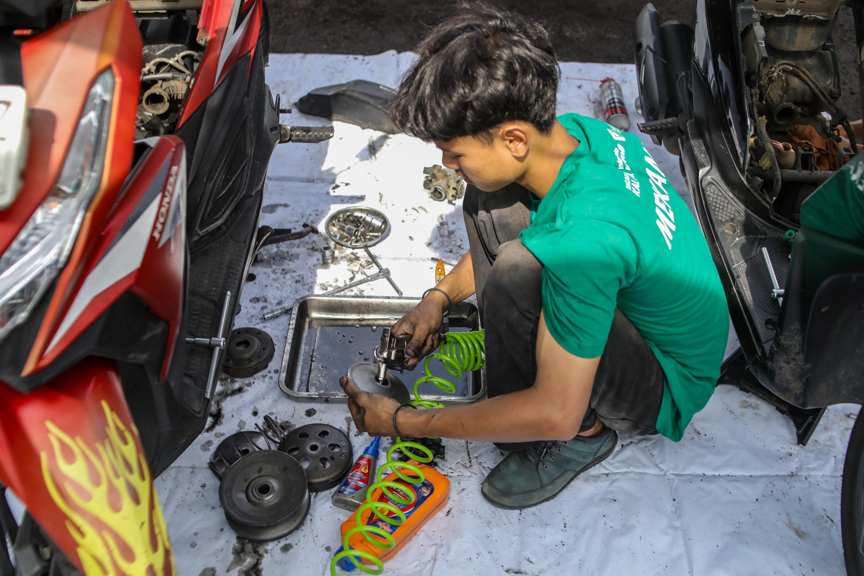 Ribuan Pengendara Motor Ojol Diperbaiki Secara Gratis